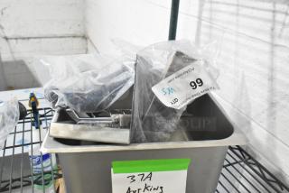 5 brand new scratch and dent items including Continental drain pan, ref bracket, AyrKing brush hanger, power cord, Winco bin.