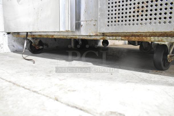 2019 Asber APTP46 commercial pizza prep table, 115V, 1 phase, on commercial casters. Visible rust on base.