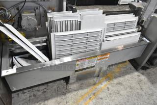 Delfield Commercial Cold Pan Drop In, 115V, 1 Phase, stainless steel, features safety labels, and appears in used condition.