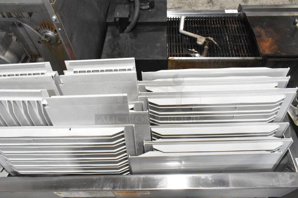 Delfield Commercial Cold Pan Drop In; 115 volts, 1 phase, stainless steel, clean condition, visible panel dividers.