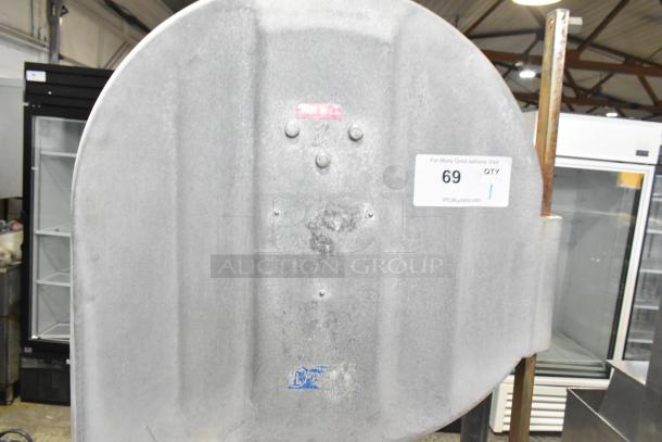 Commercial floor-style meat saw in used condition. Voltage: 208-220/440V. Markings: "Made in U.S." Label: Auction lot 69.