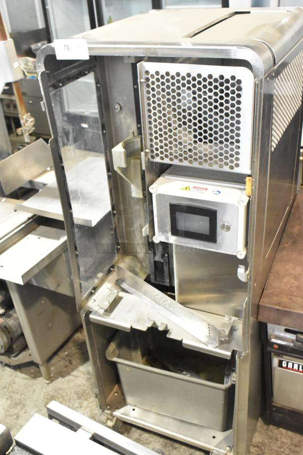 JBT 2ND-GEN-MFJ-HE commercial citrus juicer on casters, stainless steel, good condition, 115V, 1 Phase, with control panel.