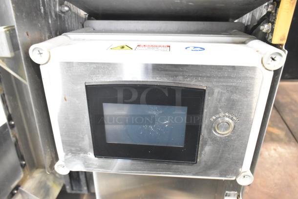 JBT 2ND-GEN-MFJ-HE citrus juicer, commercial floor style, 115V, features display and control panel, on casters.