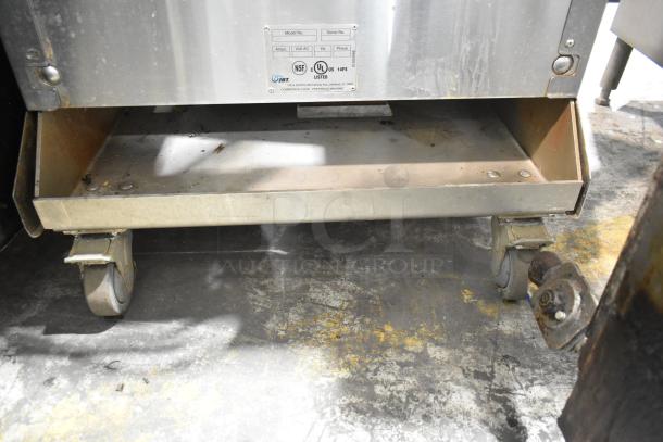 JBT 2ND-GEN-MFJ-HE Fresh N Squeeze citrus juicer on commercial casters. Stainless steel, 115V, 1 Phase. NSF, UL listed.