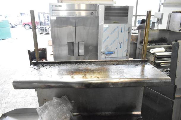 American Range commercial gas 6-burner range with oven, overshelf, backsplash, on casters; used condition, stainless steel.
