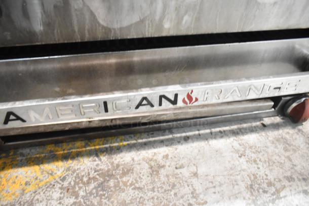 American Range Commercial Gas Powered Cheese Melter, stainless steel, used condition, visible logo on front.