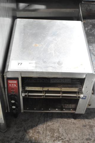 Waring CTS1000B Countertop Conveyor Toaster Oven, 208V, 1 Phase. Features front controls and visible wear.