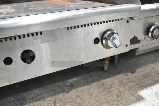 Star Commercial Gas Flat Top Griddle, stainless steel, countertop model, visible knobs, used condition.