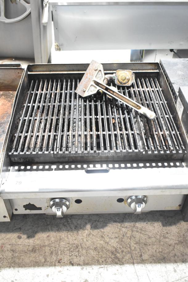 Star Max Commercial Countertop Gas Charbroiler Grill with dual control knobs, used condition, includes scraper tool.