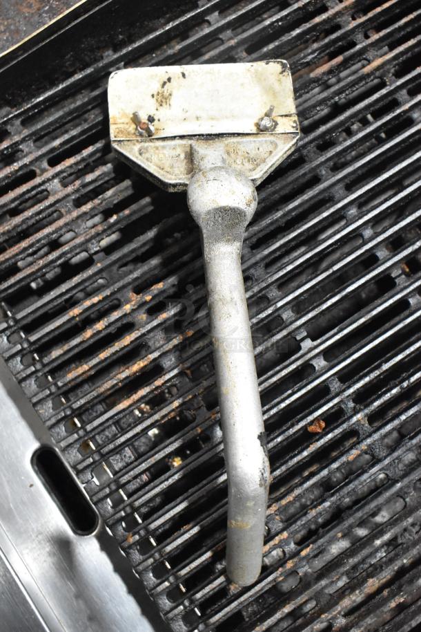 Star Max Commercial Countertop Gas Charbroiler Grill, black grates, worn handle; shows signs of use.