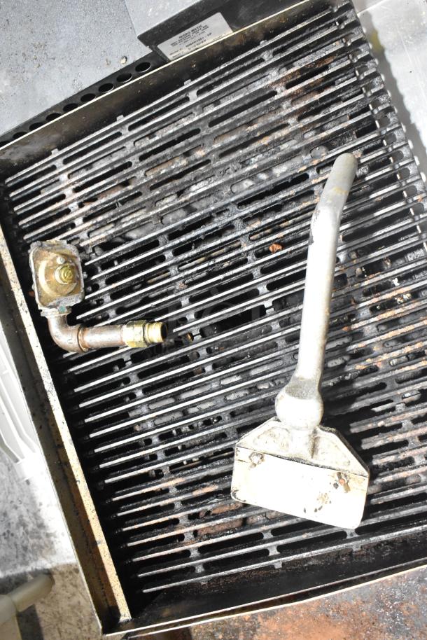 Star Max Commercial Gas Charbroiler Grill, countertop, black grates, used condition, suitable for high-volume cooking.