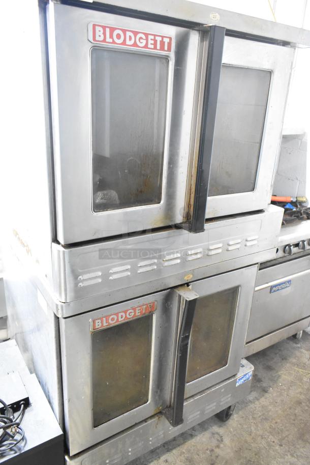 2016 Blodgett DFG-100-3 convection ovens, stainless steel, view-through doors, thermostatic controls, on commercial casters.