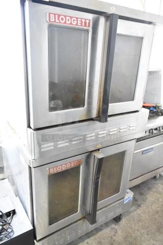 2016 Blodgett DFG-100-3 convection ovens, stainless steel, view-through doors, thermostatic controls, on commercial casters.