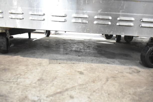 2016 Blodgett DFG-100-3 convection ovens on commercial casters, view-through doors, thermostatic controls; base view of casters.