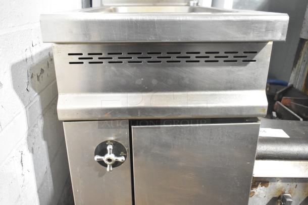 Commercial floor-style pasta cooker, stainless steel, with control knob, in used condition. Suitable for high-volume cooking.