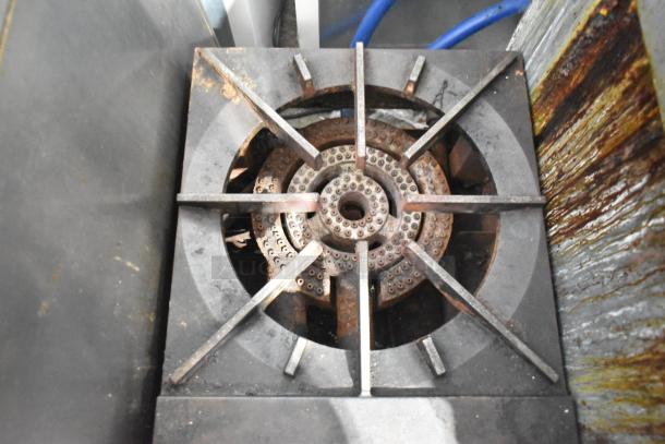 Vulcan commercial countertop gas burner for stock pots, showing rust and wear, sturdy cast iron construction.