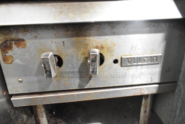 Vulcan commercial countertop gas burner, stainless steel, used condition with visible wear and rust, Vulcan label shown.