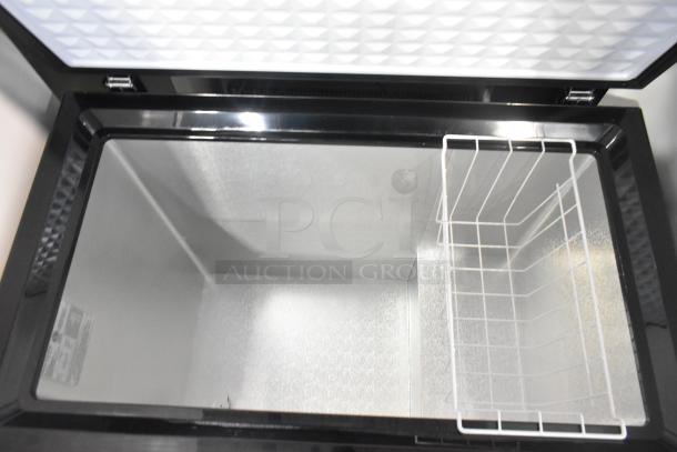 Frigidaire FGFRF7009-B-BLACK-6COM chest freezer in black, clean interior with wire basket, 115V, 1 phase.