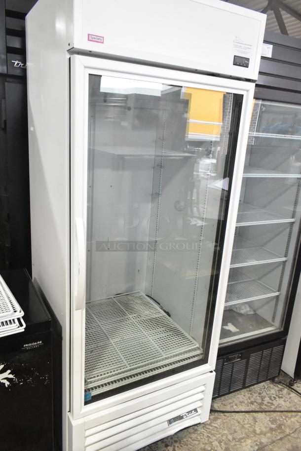 2021 True TSCI-600R-G-PH commercial single door cooler, 115V, excellent condition, glass door, white exterior.