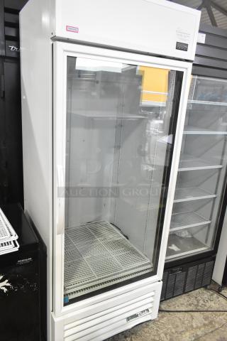 2021 True TSCI-600R-G-PH commercial single door cooler, 115V, excellent condition, glass door, white exterior.