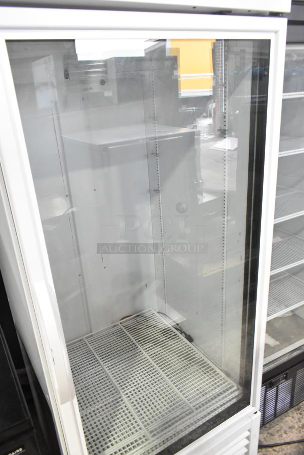 2021 True TSCI-600R-G-PH commercial cooler, single glass door, 115 volts, pristine condition, shelving intact.