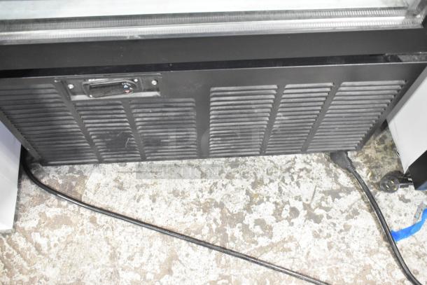 2019 Habco SE18 commercial single-door cooler merchandiser, black vent panel, 115 volts, 1 phase power cord visible.