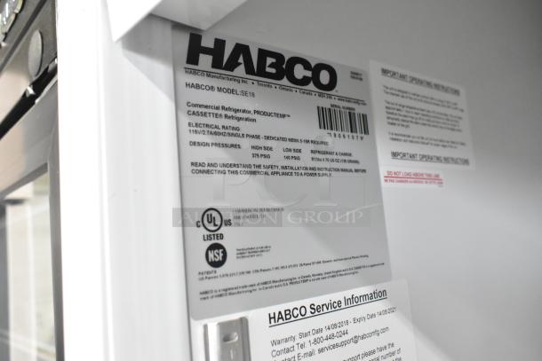 2019 Habco SE18 commercial single door reach-in cooler; 115 Volts, 1 Phase. Labels show model number and CSA/NSF certifications.