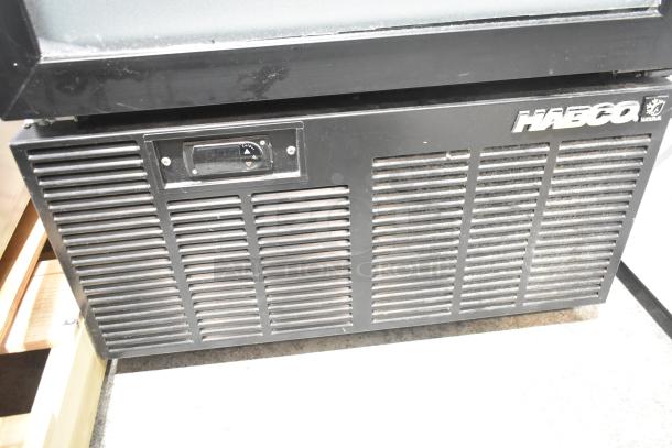 2019 Habco SE18HC commercial cooler, single door, 115V, features black vented lower front and branding.