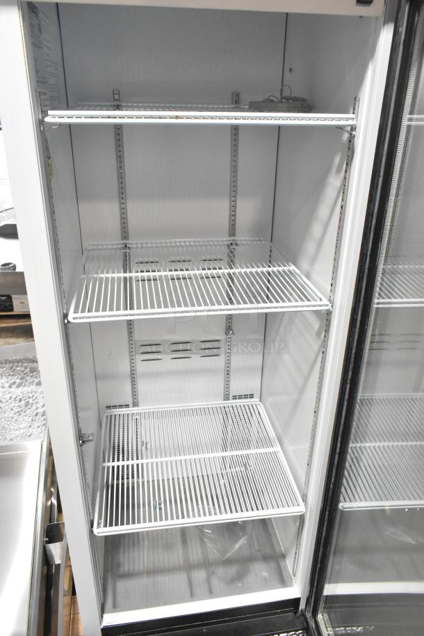 2019 Habco SE18HC commercial single door cooler, excellent condition, with adjustable shelves. Model and specs visible.