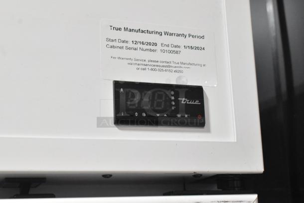 2021 True TSCI-600R-G-PH cooler, single door, reach-in, 115 volts, warranty label shows dates, serial no. 10100587.