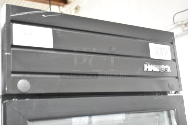 2019 Habco SE18 single door cooler, black exterior, visible Habco logo, model number, and voltage information.