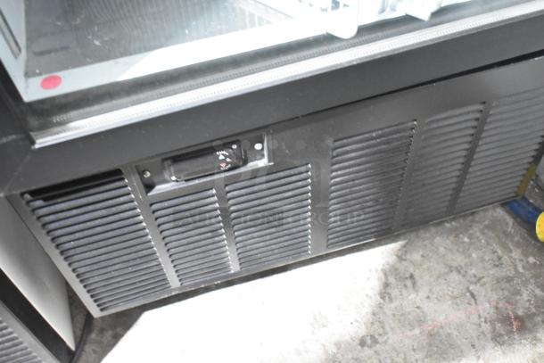 2019 Habco SE18 commercial single door cooler; black finish, temperature adjustable dial, 115 volts, 1 phase.