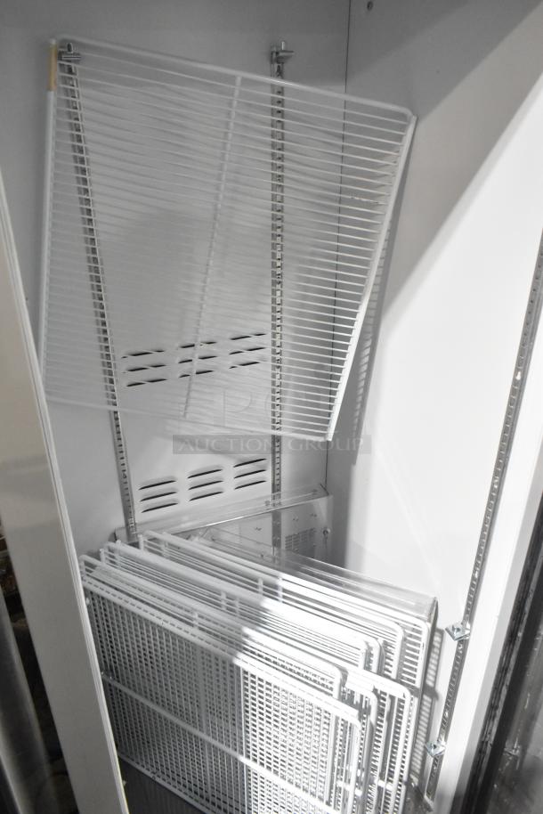 2019 Habco SE18 commercial reach-in cooler with adjustable wire shelves, 115 volts, 1 phase, pristine condition.