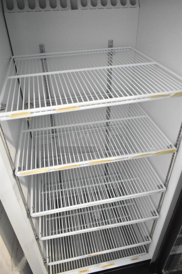 2019 Habco SE12 commercial single door reach-in cooler. Features adjustable wire shelves, 115 volts, 1 phase.