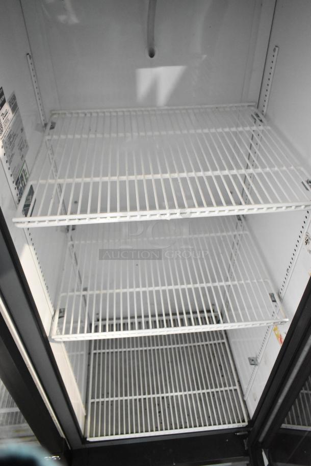 2019 True GDM-12-HC commercial cooler, single door, three shelves, 115 volts, excellent condition, interior view.