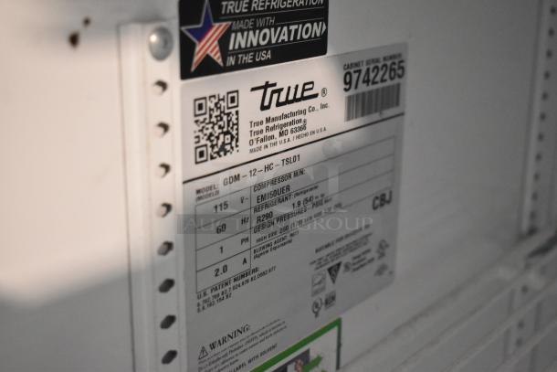 2019 True GDM-12-HC Commercial Cooler label. 115 Volts, 1 Phase, innovation tag, Model GDM-12-HC listed.