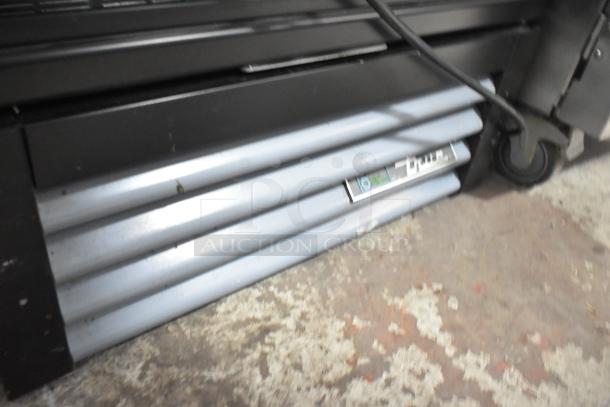 2019 True GDM-12-HC cooler base with visible True logo, 115 volts, commercial grade, in used condition.