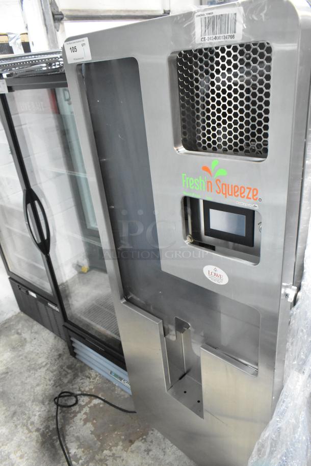 JBT Fresh N Squeeze citrus juicer, floor model on casters, stainless steel, 115 volts, touchscreen, excellent condition.