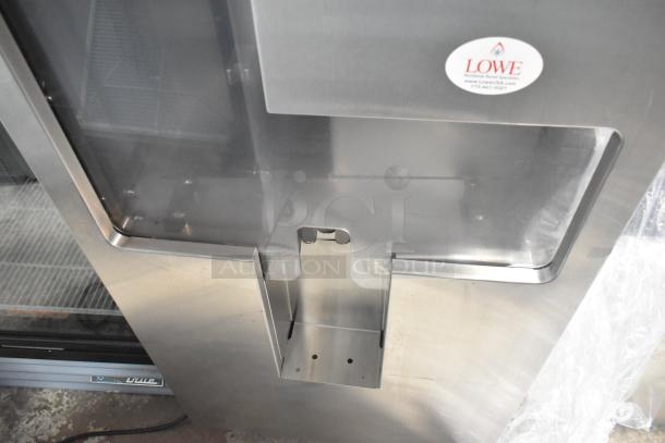 JBT Fresh N Squeeze commercial citrus juicer, floor style, stainless steel, commercial casters, 115V, 1 Phase.