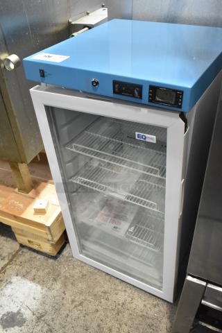 Accucold ACR32G metal mini cooler merchandiser with visible broken door, 115 volts, 1 phase; blue top, two shelves.