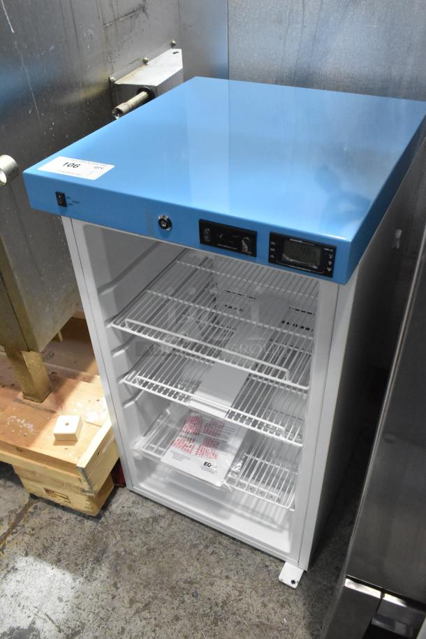 Accucold ACR32G metal mini cooler merchandiser with a broken door. Features 115 volts, 1 phase. Blue top, wire shelves.