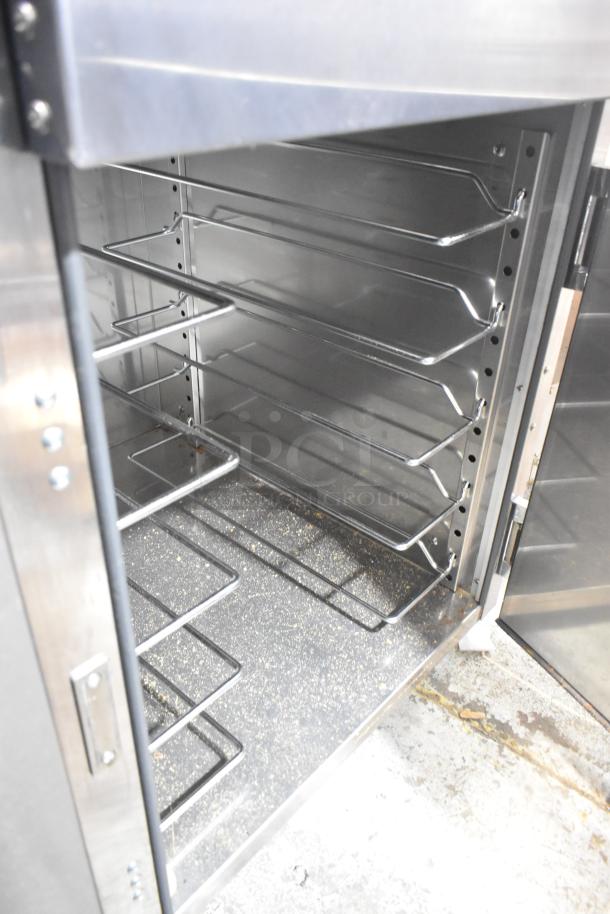 2023 Vulcan VBP15ES heated holding cabinet with commercial casters. Features multiple shelving racks, 115 volts, 1 phase.