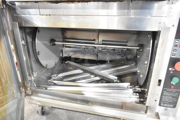 Hardt Inferno 4500 rotisserie oven, 40 bird capacity, natural gas, 95,000-101,000 BTU, commercial casters, visible controls.