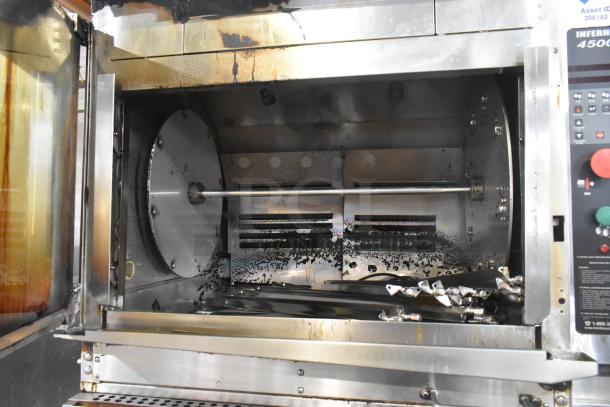 Hardt Inferno 4500 commercial rotisserie oven, natural gas, 40 bird capacity, visible controls, used condition, on casters.