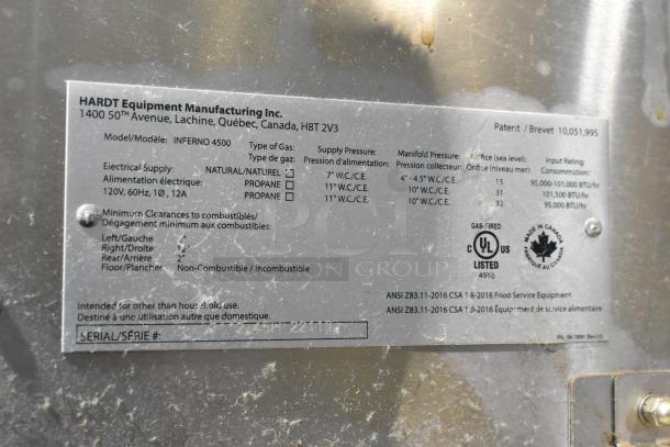 Hardt Inferno 4500 commercial rotisserie ovens nameplate detailing model, natural gas power, 95,000-101,000 BTU, and certifications.