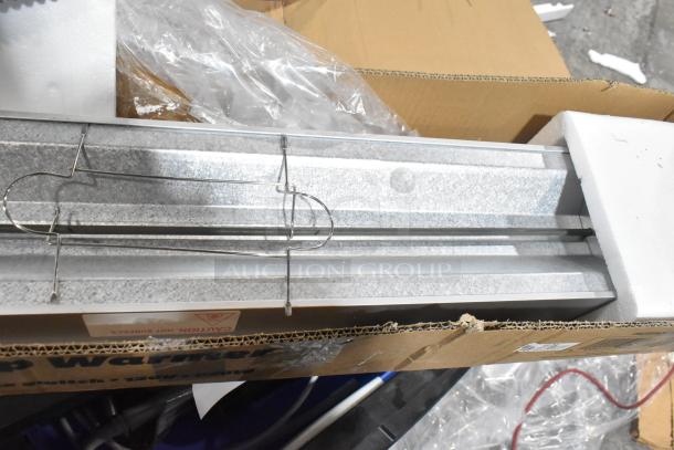 Brand new ServIt 423SW36THA 36" strip warmer with single toggle control, 120 volts, 1 phase, open box with packaging.