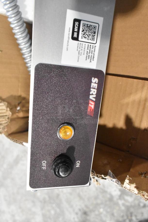 Brand new ServIt 423SW36THA 36" strip warmer, single toggle control, 120V, 1 phase, minor dents, includes label with QR code.
