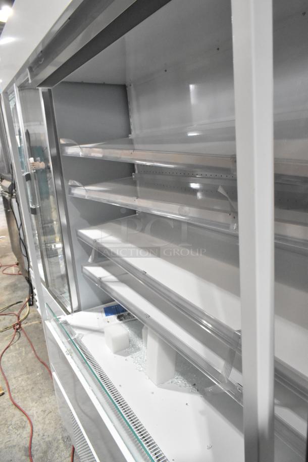 Brand new Avantco Grab N Go Merchandiser with slight scratches and dents. Open design, multiple shelves, ready for use.