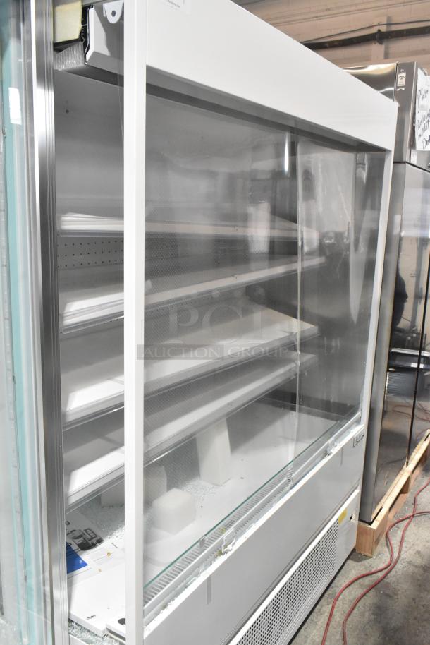 Brand new Avantco commercial grab-n-go merchandiser, scratch and dent model, features multiple shelves, ideal for display.