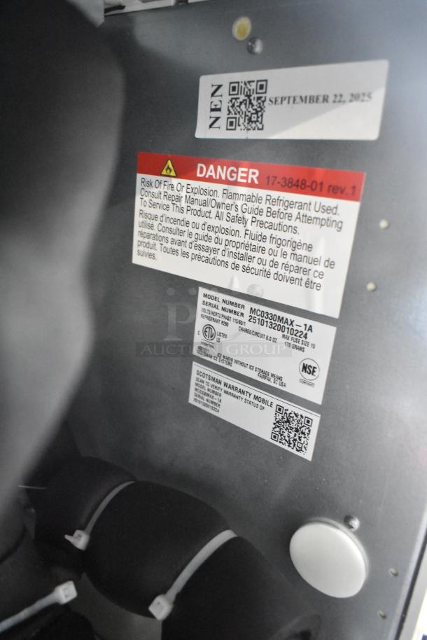 Brand new Scotsman MC0330MAX-1A ice machine, 30" medium cube, 400 lb capacity, 115V, 1 phase. Tags show model info.